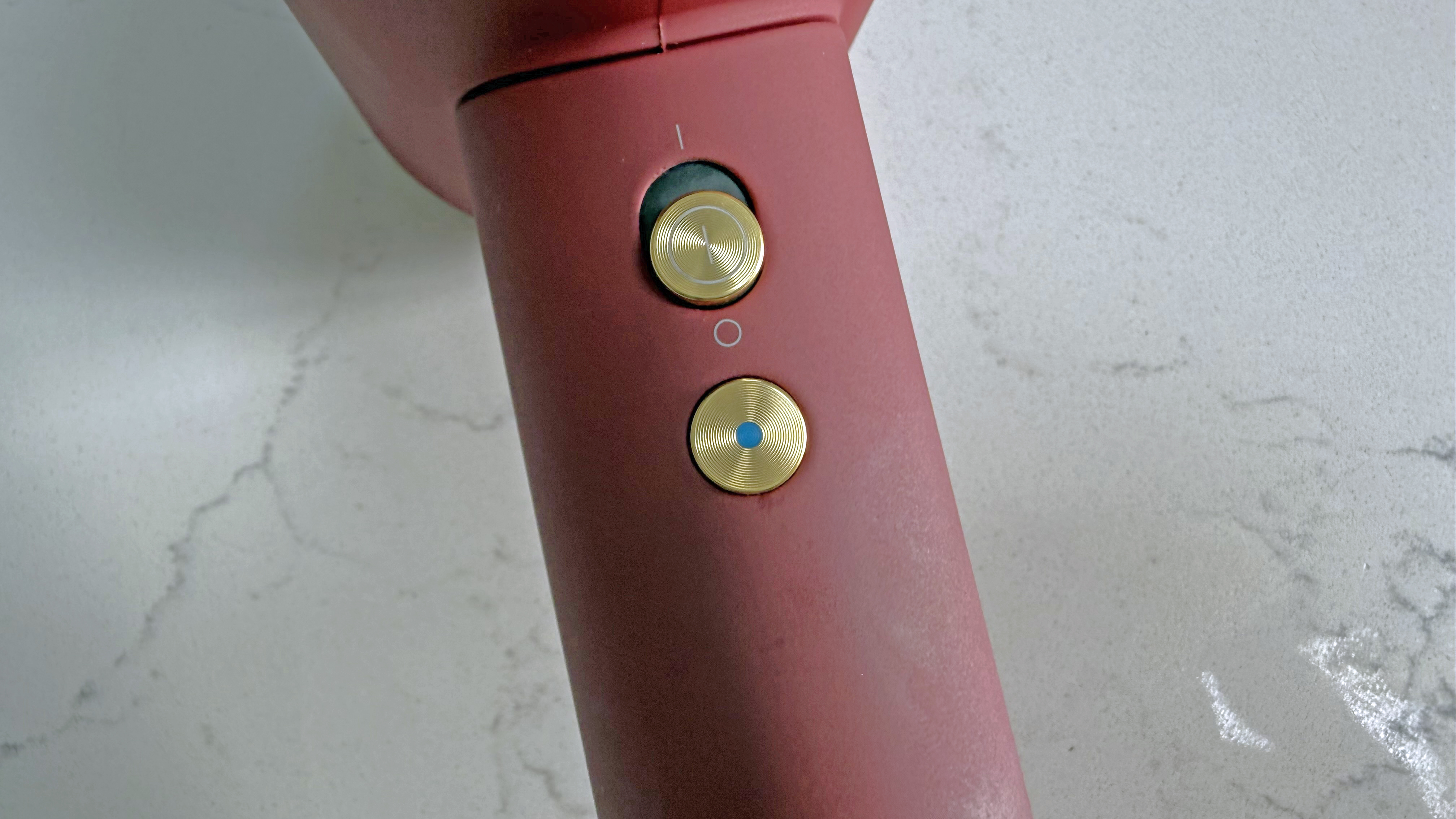 Close-up of the Dyson Supersonic Nural airflow and temperature control buttons