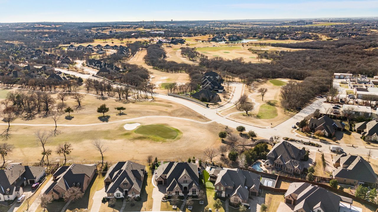 A home for sale by the Whitworth course at Trophy Club in Texas.