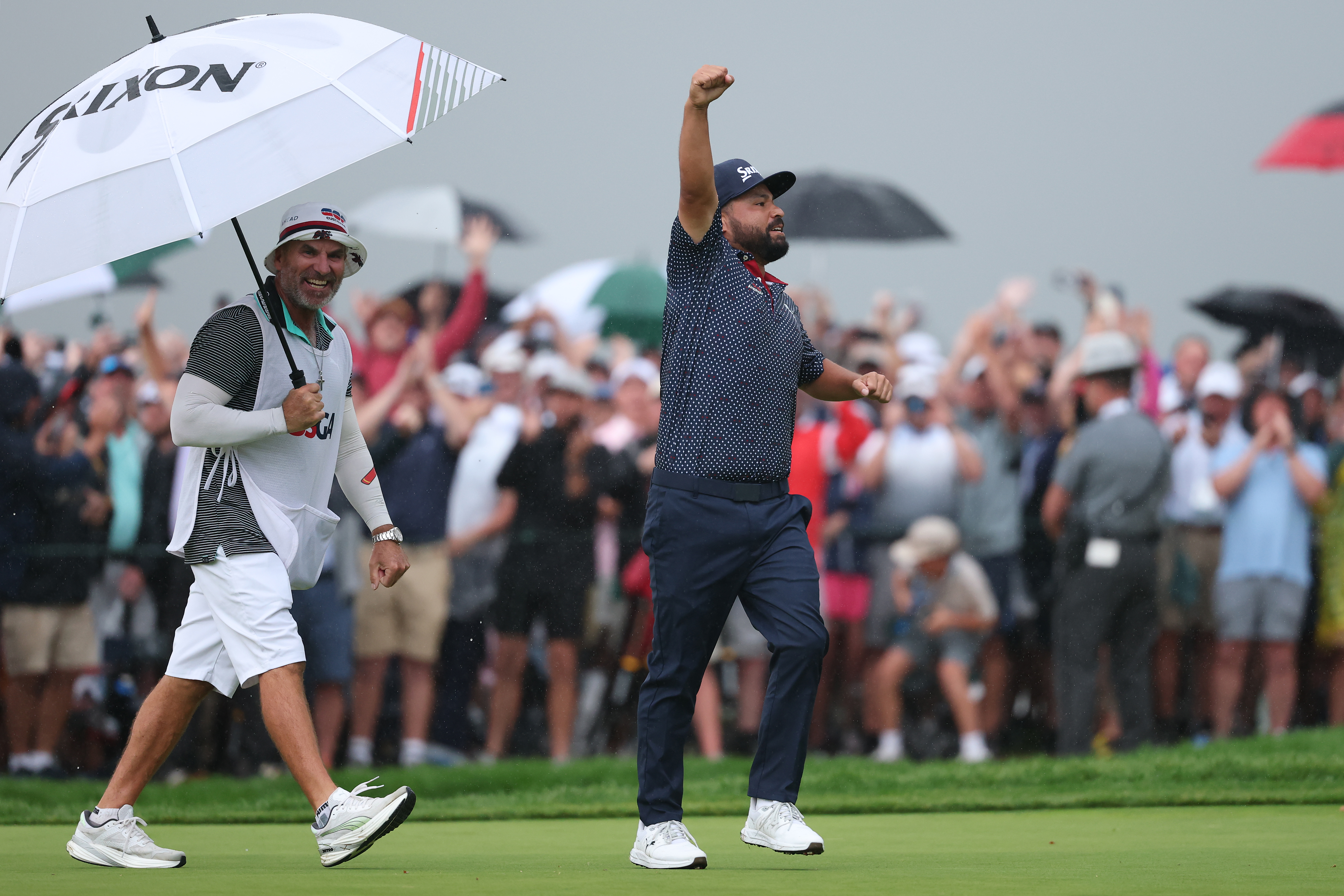 J.J. Spaun celebrates on the 18th green