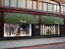 The Brompton Road facade of Harrods, where Chanel has transformed the store’s shop windows