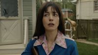 Anne Hathaway looking scared in The End of Oak Street.