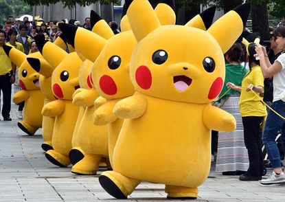 Pikachu characters perform outside of a mall near Tokyo.