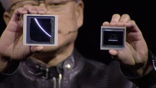 Nvidia CEO Jensen Huang holds up an Nvidia Blackwell and Nvidia Ada GPU die at GTC 2024