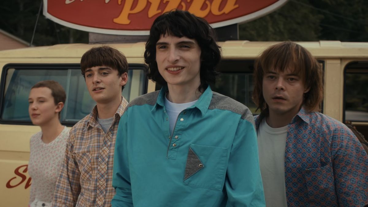 Screenshot of Mike, Will, Eleven and Jonathan getting out of Pizza van in Stranger Things Season 4 finale