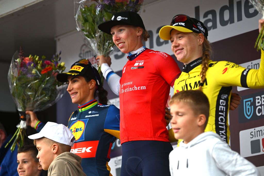 DOETINCHEM NETHERLANDS OCTOBER 12 LR Elisa Balsamo of Italy and Team Lidl Trek on second place race winner Lorena Wiebes of The Netherlands and Team SD Worx Protime and Nienke Veenhoven of The Netherlands and Team Visma Lease a Bike on third place pose on the podium ceremony after the 26th Simac Ladies Tour 2024 Stage 5 a 140km stage from Doetinchem to Doetinchem UCIWWT on October 12 2024 in Doetinchem Netherlands Photo by Luc ClaessenGetty Images