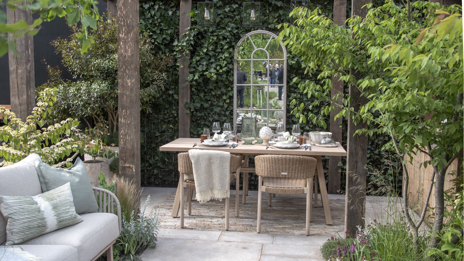 Outdoor dining area underneath a pergola