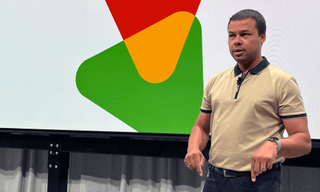 Sam Bright, Google Play's Vice President and General Manager, introduced how Google Play would expand “beyond the store” to include new features.