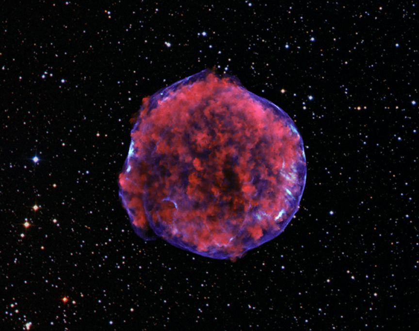 This image comes from a very deep Chandra observation of the Tycho supernova remnant. Low-energy X-rays (red) in the image show expanding debris from the supernova explosion and high energy X-rays (blue) show the blast wave, a shell of extremely energetic