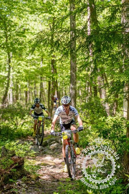Gunner Bergey leads a chase group through a winding trail.