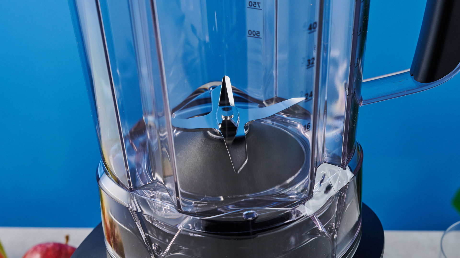 Nutribullet Power Core photographed in front of a blue background
