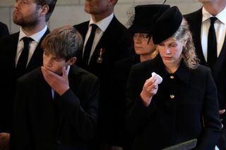 James, Viscount Severn and Lady Louise Windsor pay respects during the Lying-in State of Queen Elizabeth II on September 14, 2022 in London, England