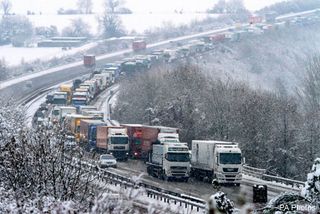 Snow causes travel chaos across the UK