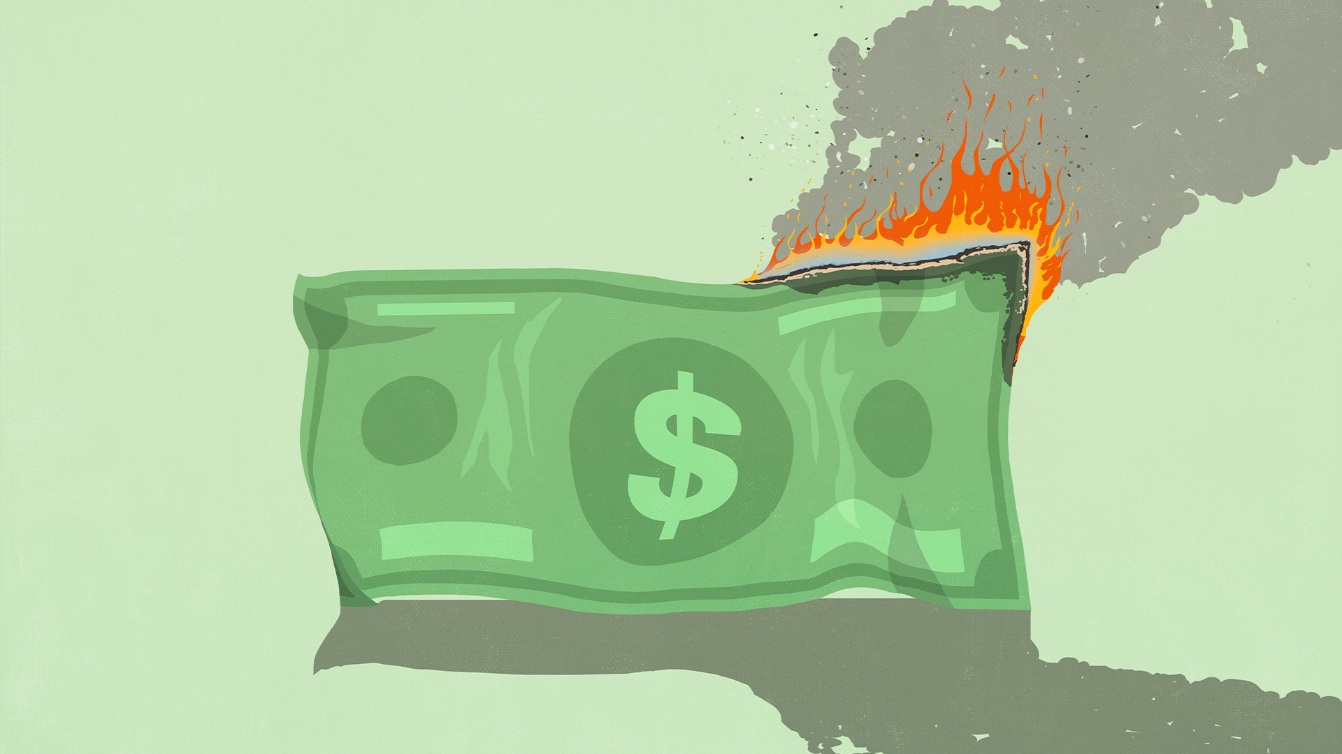 Concept image showing a US dollar bill burning at the edges with smoke pluming outwards.
