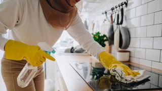 Cleaning an induction cooktop