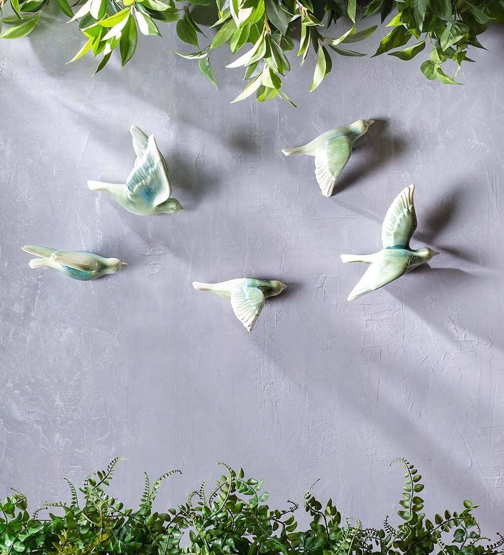 Ceramic birds on a  wall
