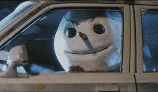 Jack Frost driving a car in his nicer looking appearance