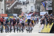 Tim Merlier celebrates victory on the opening stage of Paris-Nice