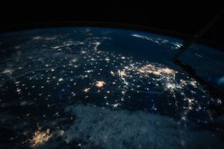 City lights illuminate southeast China by night in this photo taken by an astronaut at the International Space Station. The large, bright cluster of lights near the center of this image represent the city of Shanghai, the most highly populated city in the country, located on the coast of the East China Sea. The small, dense cluster just to the left of Shanghai is the city of Hefei, the capital of Anhui and the largest city in that province of China. In the bottom left corner of the image is Wuhan, the capital of Hubei province and "ground zero" of the novel coronavirus outbreak. This photo was taken on March 5, 2020, as the International Space Station passed over the Asian continent at an altitude of about 259 miles (417 kilometers).