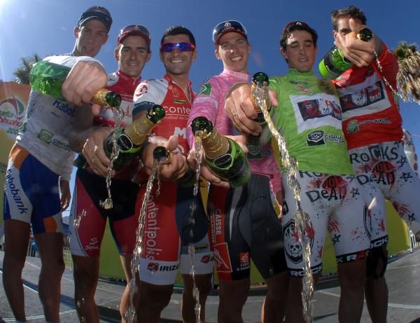 The various jersey holders pop the lids on their respective celebrations. Best not drink too much guys, there's still another stage remaining.