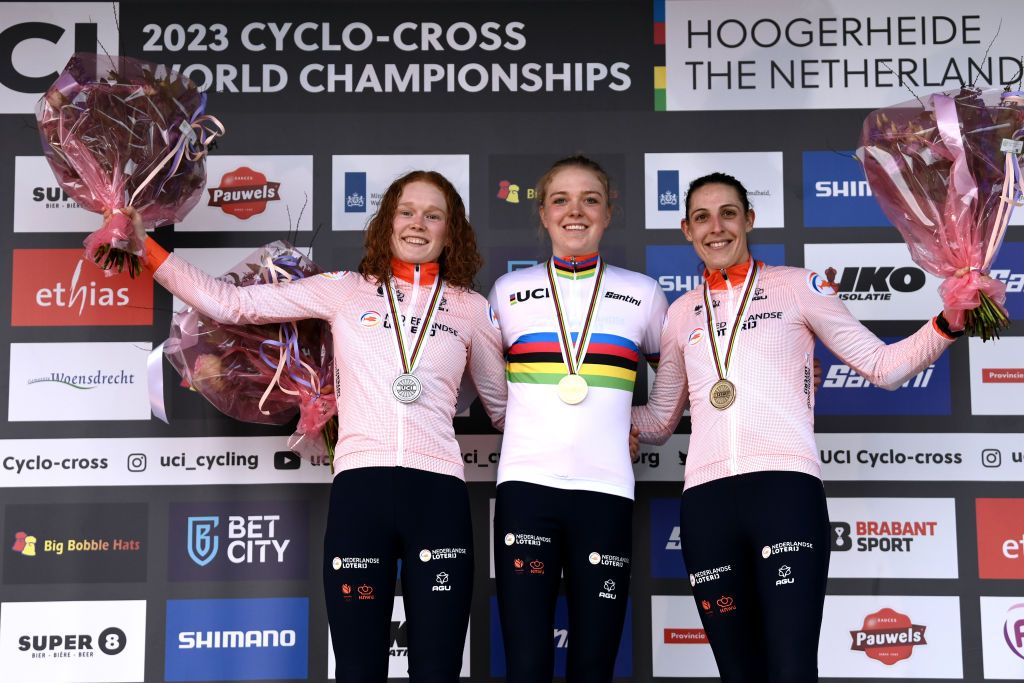 HOOGERHEIDE NETHERLANDS FEBRUARY 04 LR Silver medalist Puck Pieterse of The Netherlands gold medalist Fem van Empel of The Netherlands and bronze medalist Lucinda Brand of The Netherlands pose on the podium during the medal ceremony after the 74th World Championships CycloCross 2023 Womens Elite CXWorldCup Hoogerheide2023 on February 04 2023 in Hoogerheide Netherlands Photo by David StockmanGetty Images