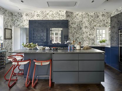 decorative kitchen with floral wallpaper and modern island