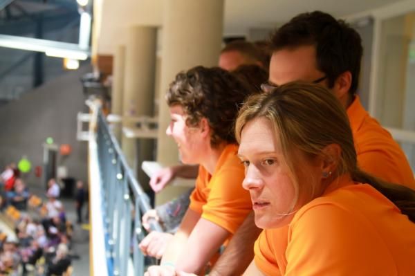 Katie Compton and Rosara Joseph watch the action at the UCI Track World Championships. Compton is a former track star.