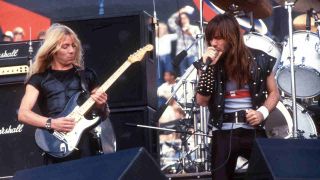 Iron Maiden’s Dave Murray and Bruce Dickinson performing onstage in 1982