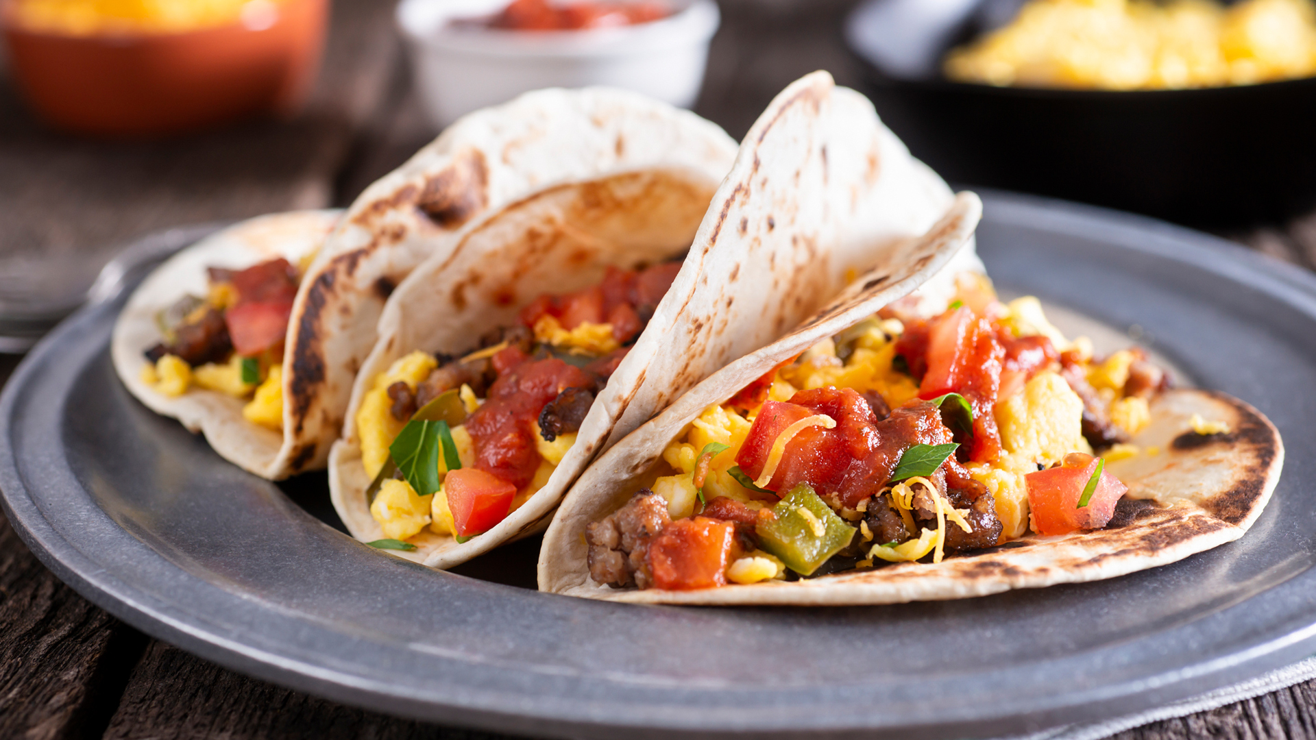 breakfast tacos filled with egg and peppers