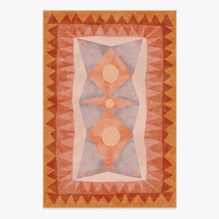 orange and pink patterned rug