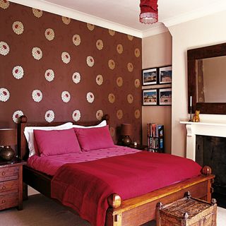 bedroom with teak bed wallpaper side table