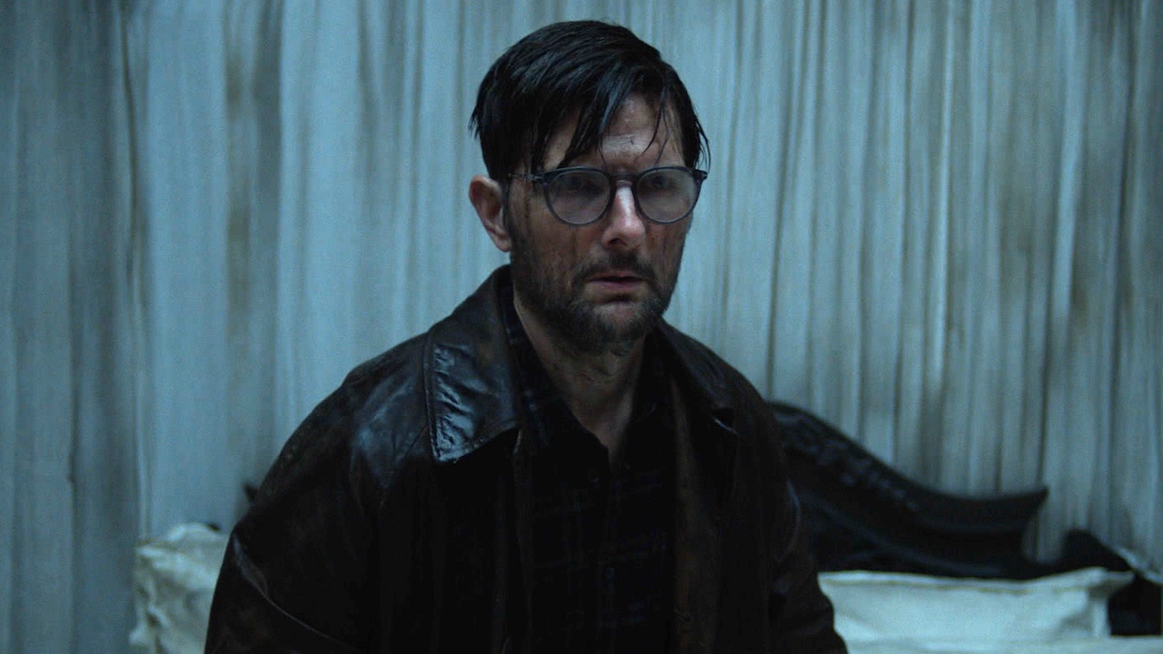 Adam Scott looking scared in Hokum
