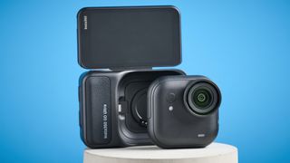 Insta360 Go Ultra against a blue background