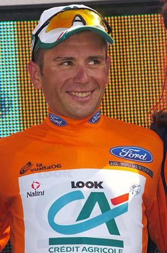 Pietro Caucchioli (Credit Agricole) smiles in the mountains jersey