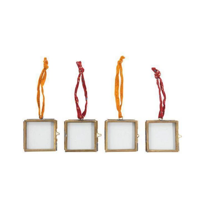 set of four mini brass photo frames with red and orange ribbons