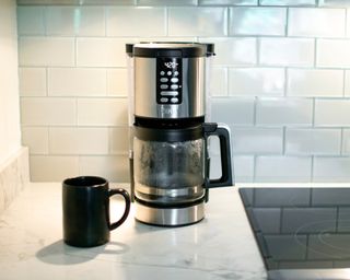 Ninja® Programmable XL 14-Cup Coffee Maker PRO in modern white tiled kitchen