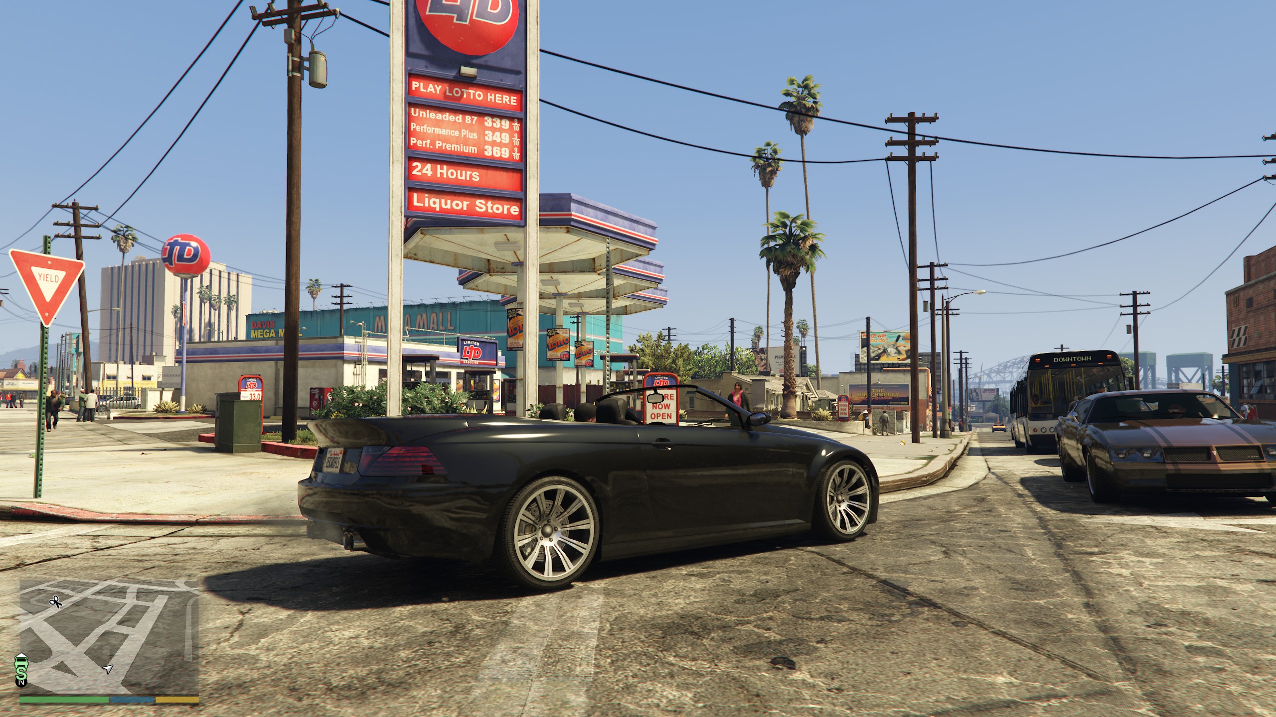 A car in front of a gas station in GTA 5 Enhanced with ray tracing enabled.