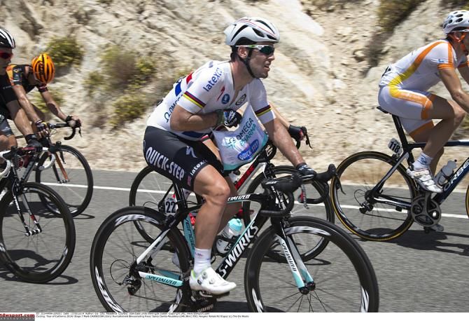 Mark Cavendish (Omega Pharma-QuickStep) takes in some food and drinks