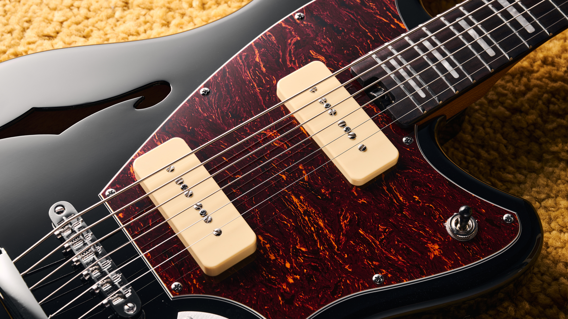 Close up of the pickups on an Orangewood Del Sol Baritone