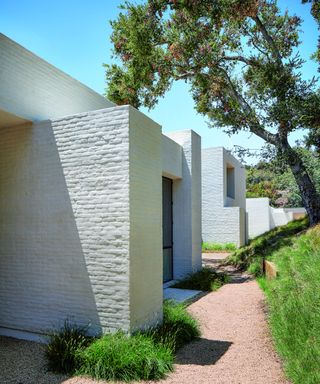 exterior of white brick modern house