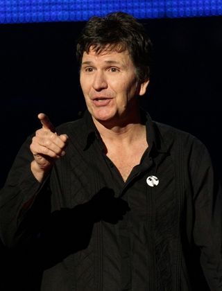 Stewart Francis on stage during the Teenage Cancer Trust Comedy Night