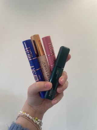 mica holding up four of the Best Coloured Mascaras