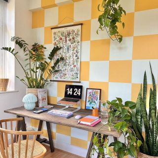 checkerboard yellow walls in a study area
