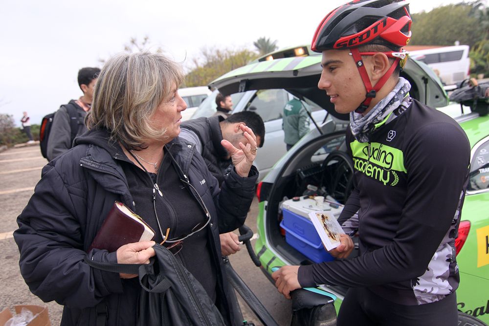 Development team rider Ori Leonzini talks with a sight seer at the Church of the Beatitude