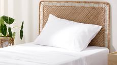 Bedsure Bamboo Cooling Sheets Set in white on twin bed with rattan headboard