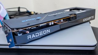 AMD Radeon RX 6600 on a laptop, showing its side design and power connector