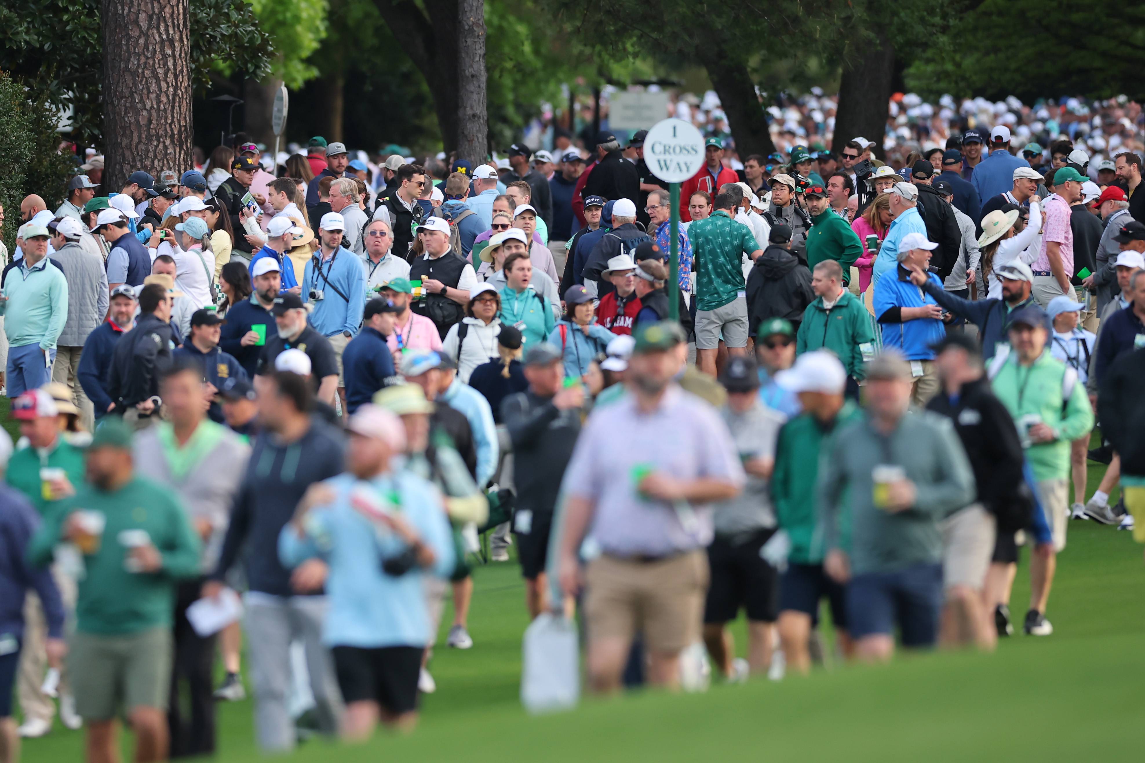 Patrons walk the course during a practice round prior to the 2026 Masters Tournament at Augusta National Golf Club
