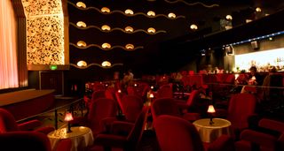 Red chairs and gold tables