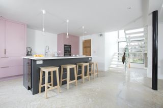 While cost-effective staircase ideas in a pink kitchen
