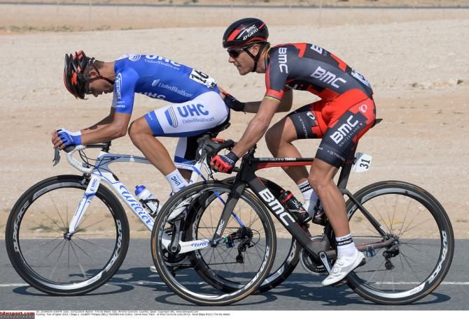 Philippe Gilbert gives Kiel Reijenen a nudge forwards
