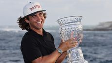 Garrick Higgo with the Corales Puntacana Championship trophy